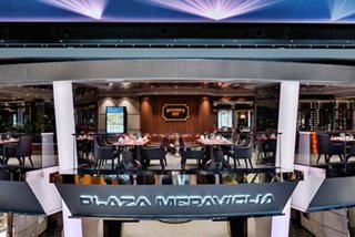 A vibrant view of the Plaza Meraviglia restaurant entrance on MSC Meraviglia, inviting guests to enjoy a delightful dining experience | MSC Cruises