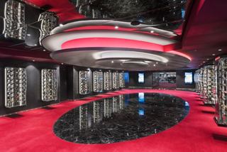 Elegant corridor leading to Waves Restaurant aboard MSC Meraviglia, showcasing a modern design and inviting atmosphere | MSC Cruises