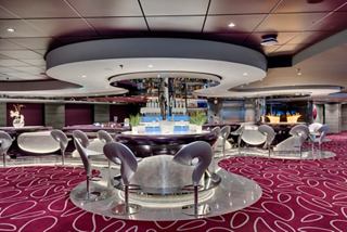 A stylish bar area with seating and a vibrant atmosphere, perfect for socialising on board | MSC Cruises