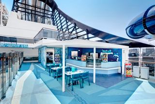 A vibrant bar area on the MSC Meraviglia, featuring a stylish design and inviting seating | MSC Cruises
