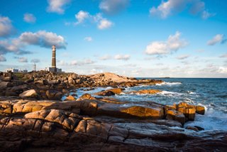 The coastline of Punta del Este featuring a lighthouse and serene sea views | MSC Cruises