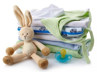 A soft toy rabbit, a soother, and neatly stacked laundry create a warm, welcoming atmosphere for families | MSC Cruises