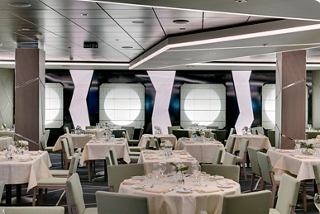 Elegant dining area in the Ipanema Restaurant aboard MSC Seaside, featuring modern decor and ample seating | MSC Cruises