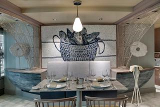 Elegant dining setup in the Ocean Cay Restaurant, featuring a table ready for guests to enjoy a delightful meal together | MSC Cruises