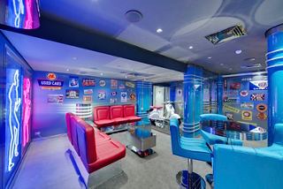 A vibrant disco lounge featuring colourful seating and energetic decor, perfect for socialising and dancing | MSC Cruises