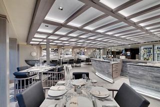 A stylish dining area featuring elegant tables and modern decor, inviting guests to enjoy memorable meals | MSC Cruises