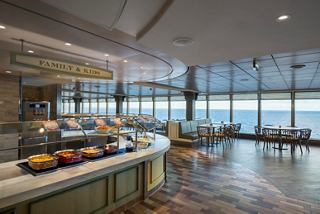 Spacious dining area featuring a buffet and stunning sea views | MSC Cruises