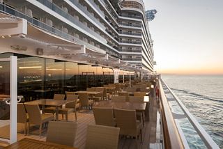 Outdoor dining area on MSC Seaside with stunning sea views | MSC Cruises