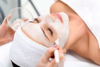 A guest enjoys a relaxing facial treatment at the MSC Aurea Spa on board | MSC Cruises