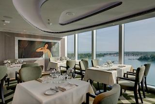Modern restaurant with a sea view and a welcoming atmosphere | MSC Cruises