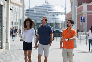 Three friends enjoying a sunny day in Lisbon, ready for an exciting excursion together | MSC Cruises