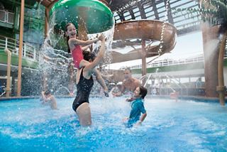 Family enjoys water play in the aquapark on MSC Seaview | MSC Cruises