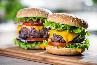 Delicious cheeseburgers stacked with fresh ingredients, ready to enjoy on your culinary journey | MSC Cruises