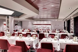 Elegant dining setup in the main restaurant featuring a sophisticated atmosphere and inviting decor | MSC Cruises