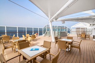 Aurea Bar on the MSC Seaview features inviting seating with beautiful sea views for relaxation and enjoyment | MSC Cruises