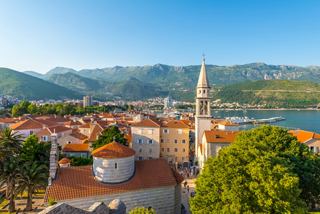 A panoramic view of the picturesque town of Bar, Montenegro, showcasing its historic buildings and stunning coastline | MSC Cruises