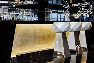 Elegant bar counter showcasing Swarovski crystal touches, inviting guests to enjoy a luxurious experience | MSC Cruises