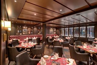 A warm and inviting dining area featuring elegant tables and chairs, perfect for enjoying a meal | MSC Cruises