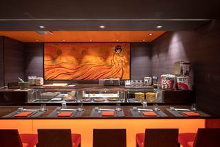 A beautifully arranged dining area at Kaito Sushi Bar, featuring elegant seating and vibrant decor | MSC Cruises