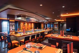 A vibrant interior of the Kaito Teppanyaki restaurant, showcasing its inviting ambiance and dining setup | MSC Cruises