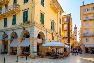 Charming streets of Corfu lined with historic buildings, inviting visitors to explore the vibrant atmosphere | MSC Cruises