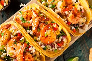 Delicious shrimp tacos filled with fresh ingredients, served at Hola Tacos & Cantina | MSC Cruises