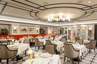 An elegant dining area featuring tables and chairs, designed for a memorable dining experience | MSC Cruises