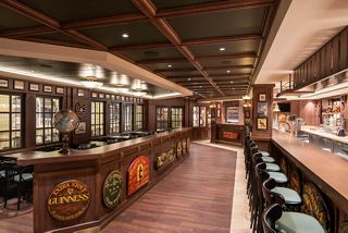 The inviting bar area of Masters of the Sea on MSC Virtuosa offers a warm atmosphere for relaxation and socialising | MSC Cruises