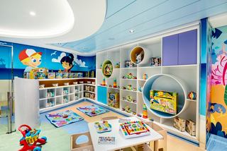 A vibrant Baby Club Chicco space on MSC Virtuosa filled with toys and cheerful decor for young children to enjoy | MSC Cruises
