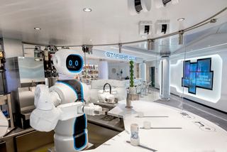 A friendly robot bartender, Rob, serves drinks at the MSC Starship Club on board MSC Virtuosa | MSC Cruises