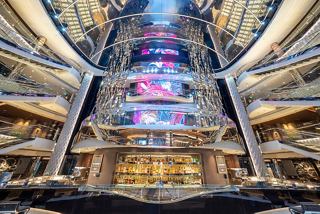A vibrant atrium featuring the Seashore Bar, inviting guests to relax and socialise in a stylish atmosphere | MSC Cruises