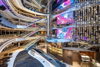 The vibrant atrium of MSC Seashore features stylish bars and lounges with a welcoming atmosphere | MSC Cruises