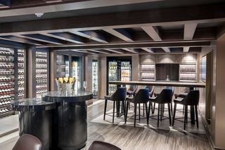 Modern bar area featuring comfortable seating and a stylish ambiance | MSC Cruises