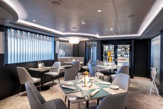 A stylish seafood specialty restaurant with elegant chairs, tables, and decorative elements for a memorable dining experience | MSC Cruises