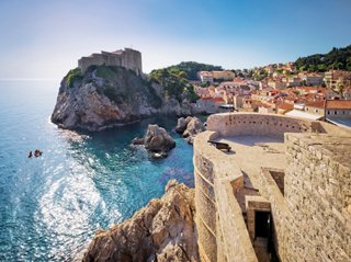 A scenic view of Fort Lovrijenac overlooking the tranquil sea in Dubrovnik, Croatia | MSC Cruises