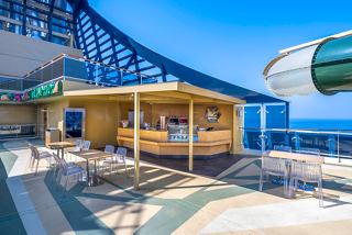 The onboard bar offers comfortable seating with ocean views and a relaxing atmosphere | MSC Cruises