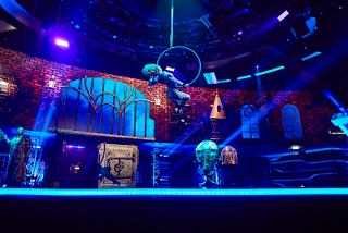 A vibrant show scene onboard MSC Virtuosa with dynamic lighting and performers creating an enchanting atmosphere | MSC Cruises