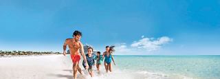 Teens hanging out in a lounge area with games | MSC Cruises