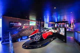 A vibrant family entertainment area featuring the MSC Formula Racer and VR Moto experience | MSC Cruises