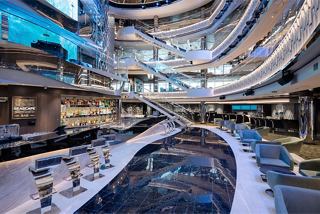 A modern bar featuring elegant decor and a cozy atmosphere for relaxation | MSC Cruises