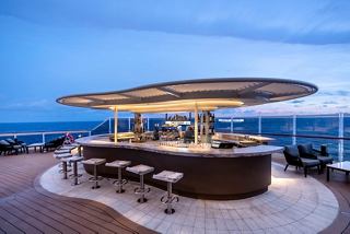 Contemporary deck bar offering stunning views of the sea | MSC Cruises