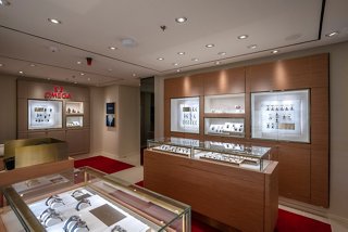 A stylish shop interior featuring elegant displays of luxury watches and accessories | MSC Cruises