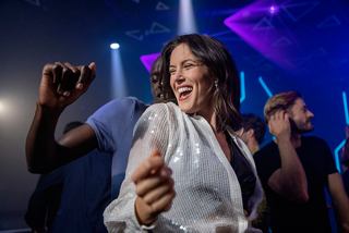 A group of friends dances joyfully at a party on MSC World Europa | MSC Cruises
