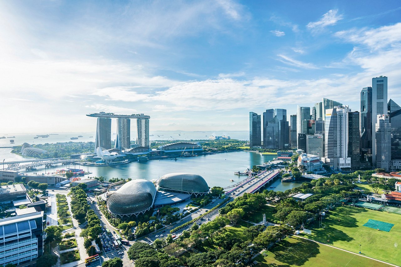A stunning view of Singapore's Marina Bay featuring iconic skyscrapers and the ArtScience Museum | MSC Cruises