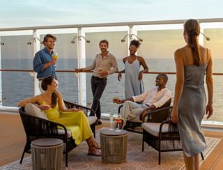 Six people are enjoying a drink on a cruise | MSC Cruises