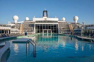 The inviting pool area on MSC World America, perfect for relaxation and enjoyment in the sun | MSC Cruises