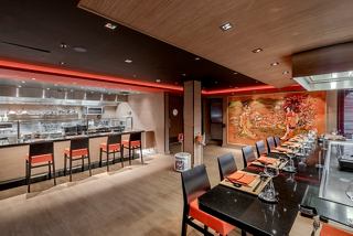 A stylish interior of the Kaito Robatayaki restaurant featuring warm colours and a welcoming atmosphere | MSC Cruises