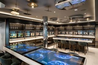 A stylish bar area on MSC Euribia featuring elegant seating and a vibrant atmosphere for socialising | MSC Cruises