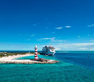 A serene aerial view of MSC Seascape anchored near Ocean Cay, showcasing the beauty of the Bahamas | MSC Cruises