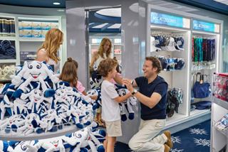 Families enjoy a fun shopping experience at the MSC Shop onboard MSC Seashore | MSC Cruises